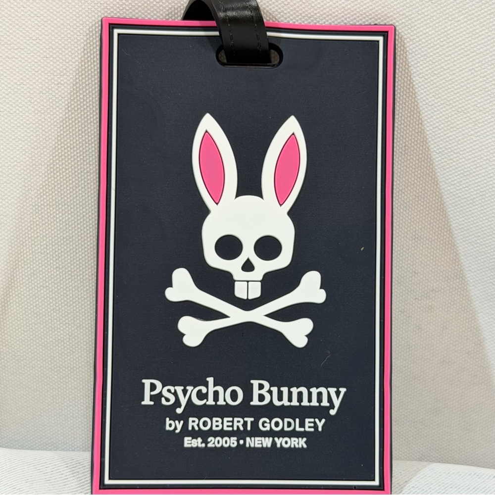 Psycho Bunny luggage Tag Black And Pink Mens Fashion Iconic Accessories